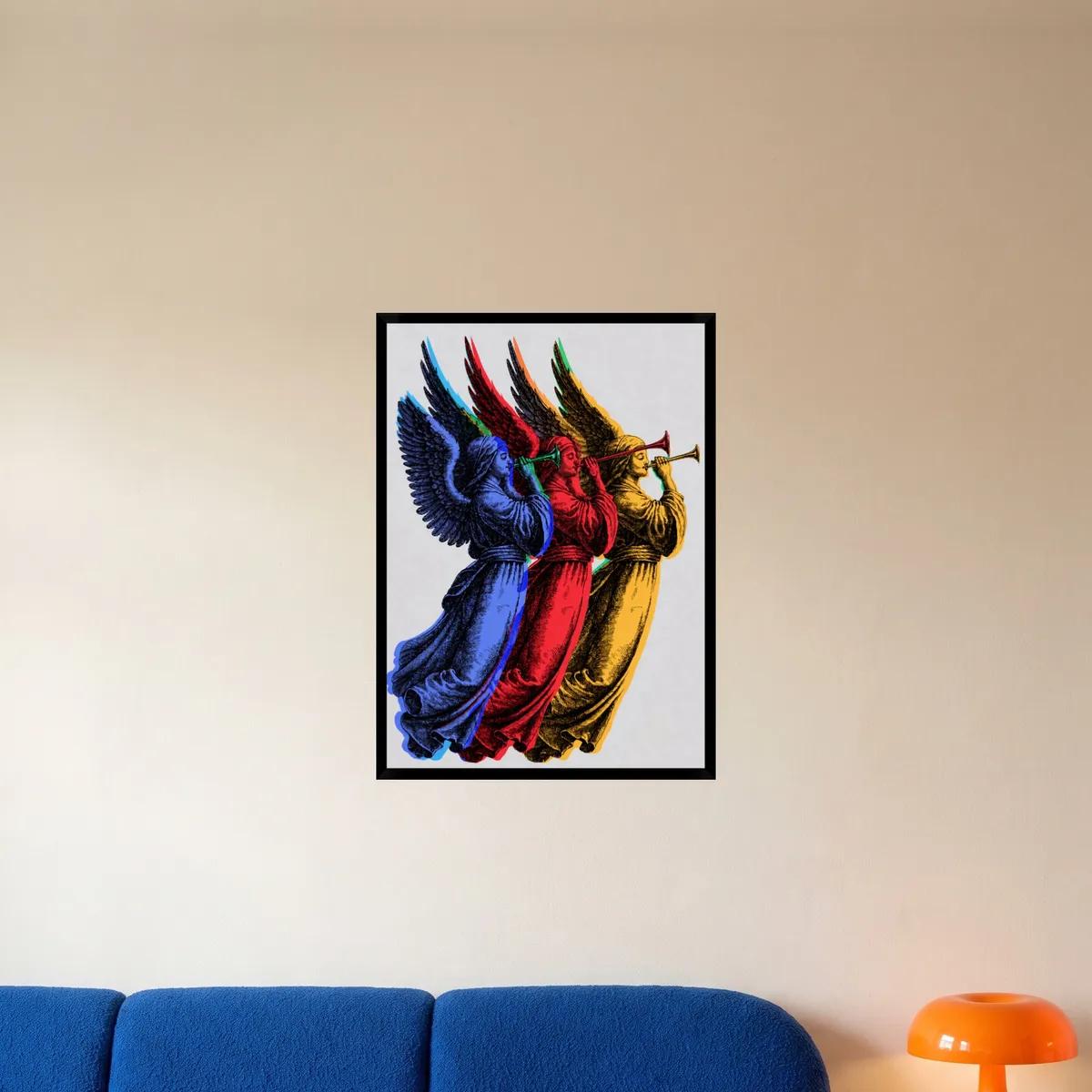 Vintage angels with trumpets in blue, red and gold, in a black frame above a blue sofa