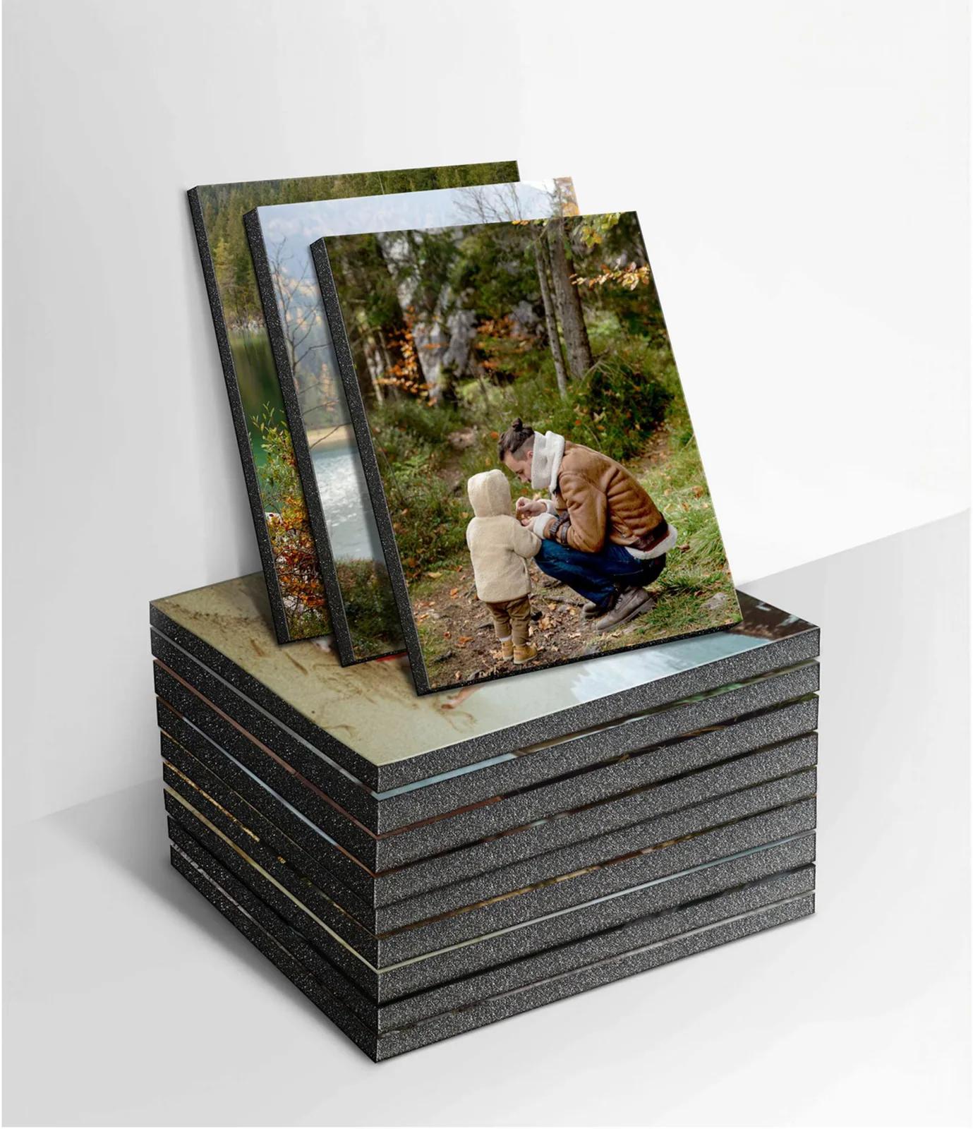 Foam photo tiles mounted in a grid on a wall